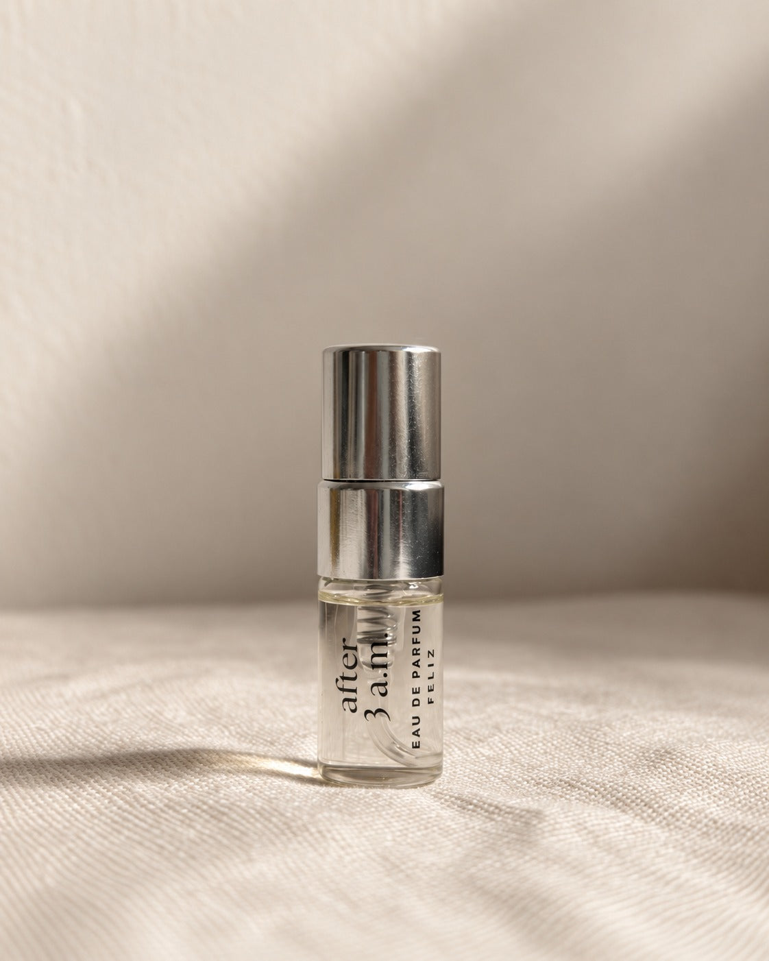 03 after 3 a.m. 2ml perfume sample bottle on warm linen