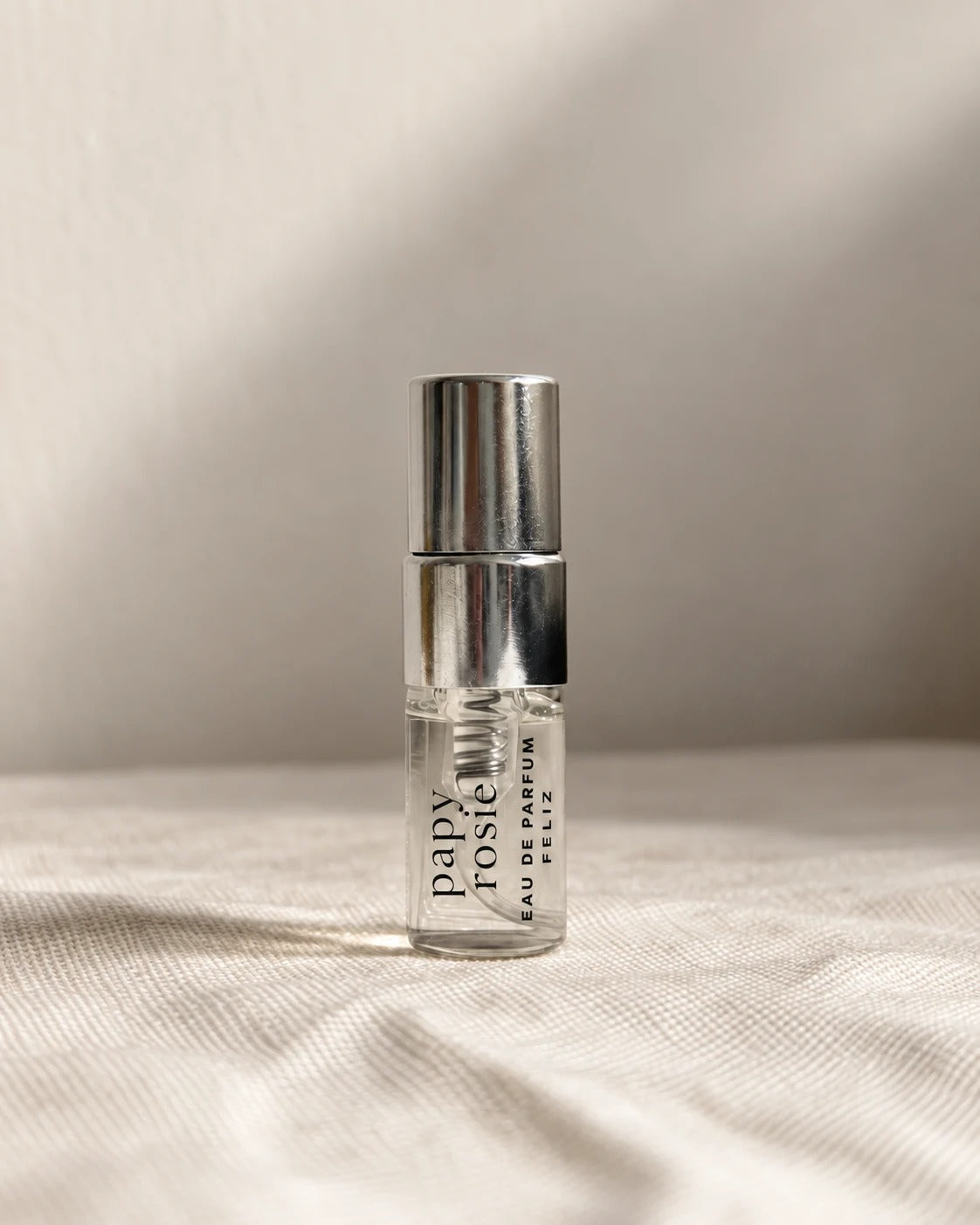 02 Papy ~ Rosie 2ml perfume sample bottle on warm linen