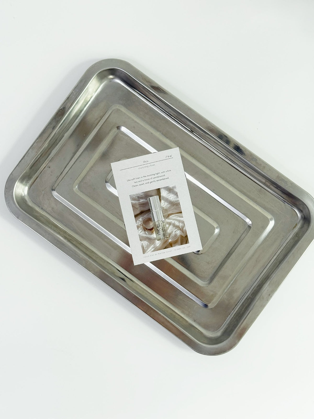 théa 2ml tester with its scent card